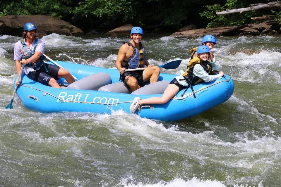 A family rafting the Ocoee River in a Raft1 boat